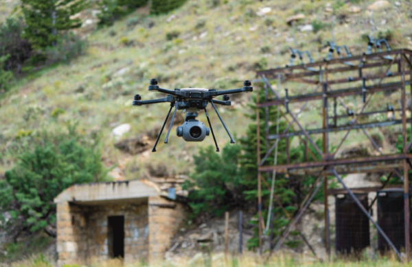 The SkyRanger R70 flying next to a mountain