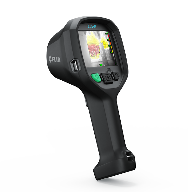 FLIR K85-N firefighting thermal imaging camera, three-quarter view showing the screen with a thermal scene and the control buttons